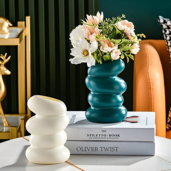 080ffc2bef5f4954b0c43d9bae00e52d-goods.jpeg Stylish Home Decor Vase with a Unique Shape