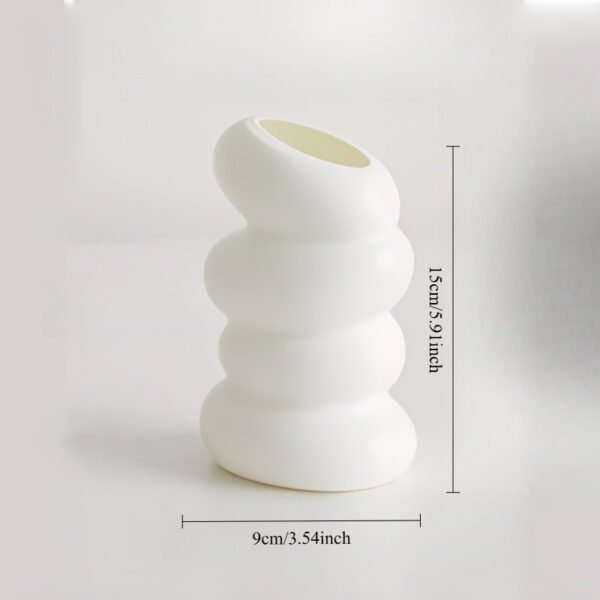 ab3d692fcabc4a6b8bf5081cee13011a-goods.jpeg Stylish Home Decor Vase with a Unique Shape